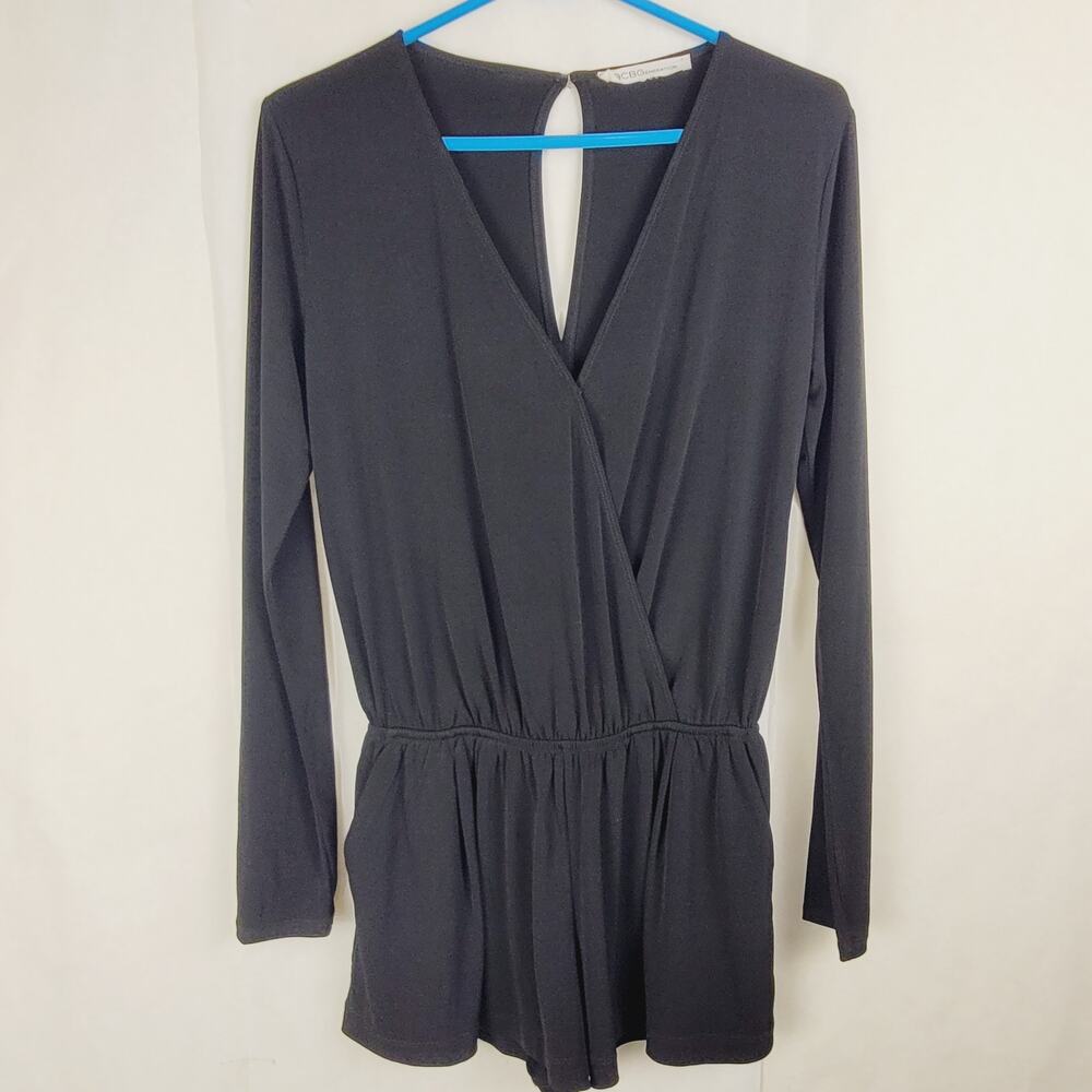 BCBGeneration black vneck long sleeved romper Size small pockets Goth Staple